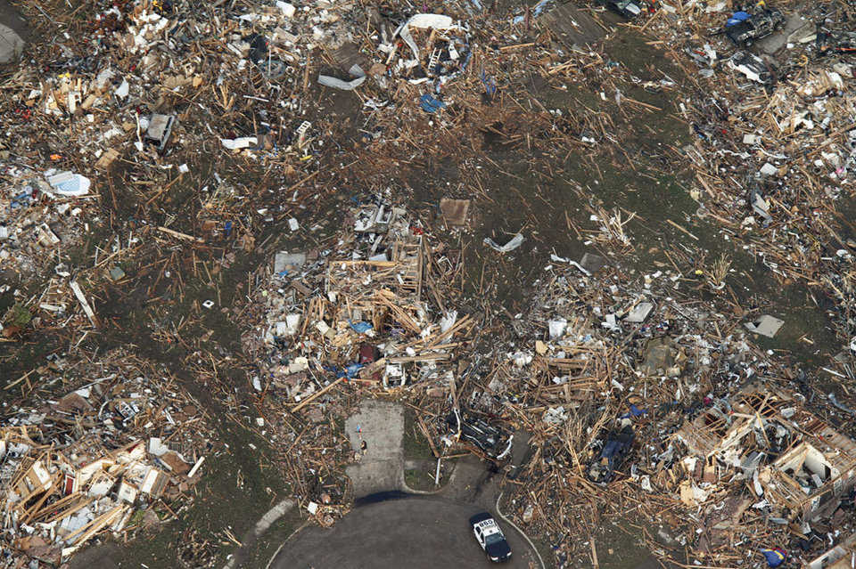 This aerial photo shows the remains of homes, after being flattened by a massive tornado in Moore, Oklahoma, on May 20, 2013.