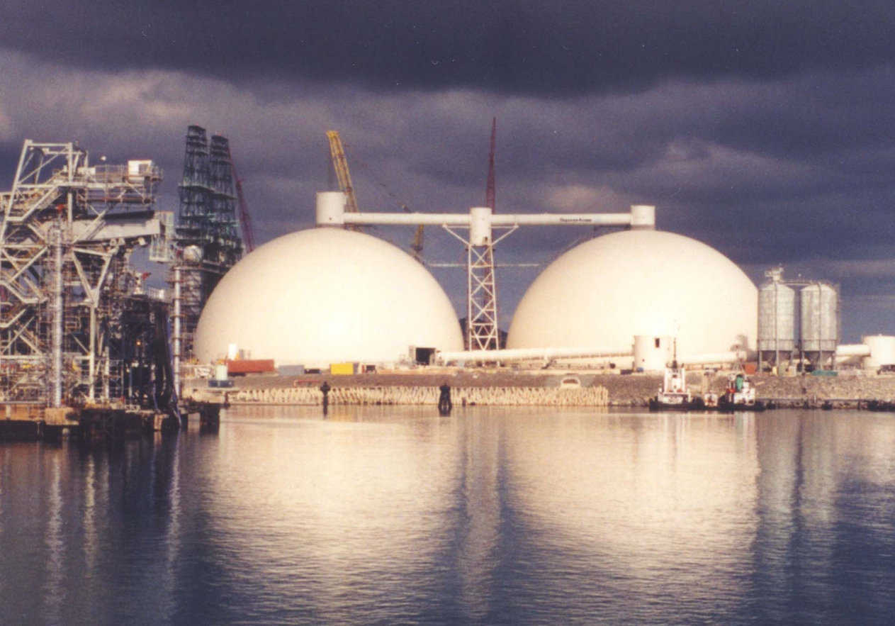 Petroleum Coke Storage — In St. Croix, US Virgin Islands, Hovensa Coker Storage, Bechtel Corp. has two 254′ × 127′ Monolithic Domes. With a capacity of 40,000 metric tons, they’re the world’s largest petroleum coke storages. After this photo was taken, an equipment tower and conveyor system was set on top of the domes. The weight allowance was one million pounds.