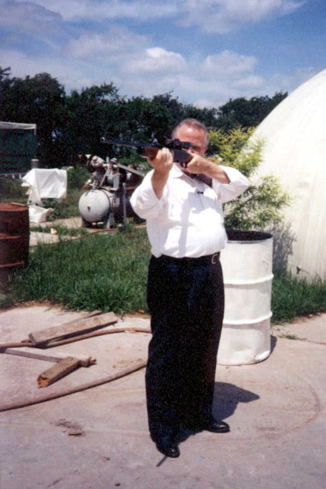 David B. South takes aim at a dome with his .30-06 rifle during a bulletproof demonstration for a Dallas TV station in the late ’90s.