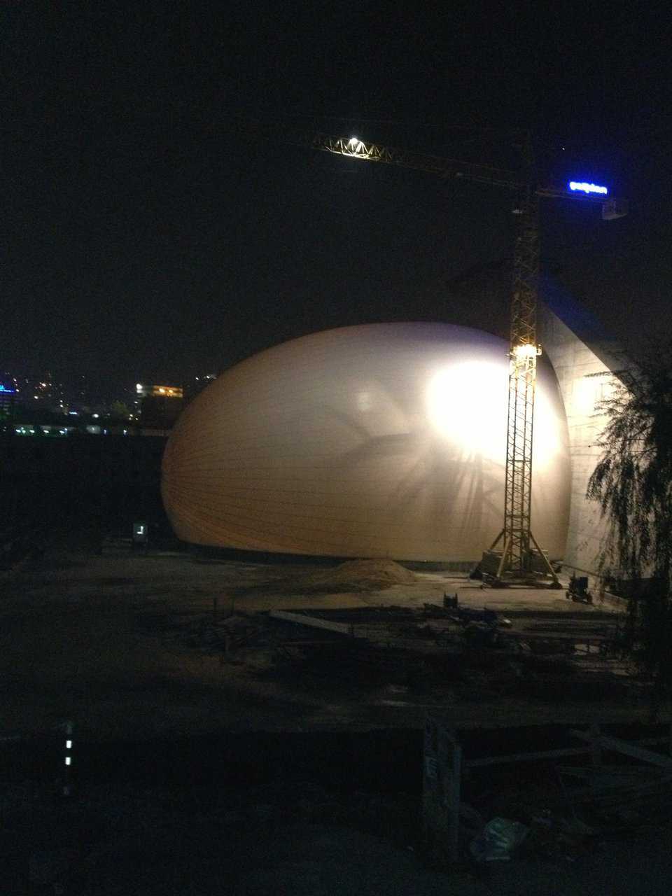 Bright lights illuminate the sleek curves of the Ankara CSO Concert Hall’s ellipsoid dome at night on Ataturk Boulevard.