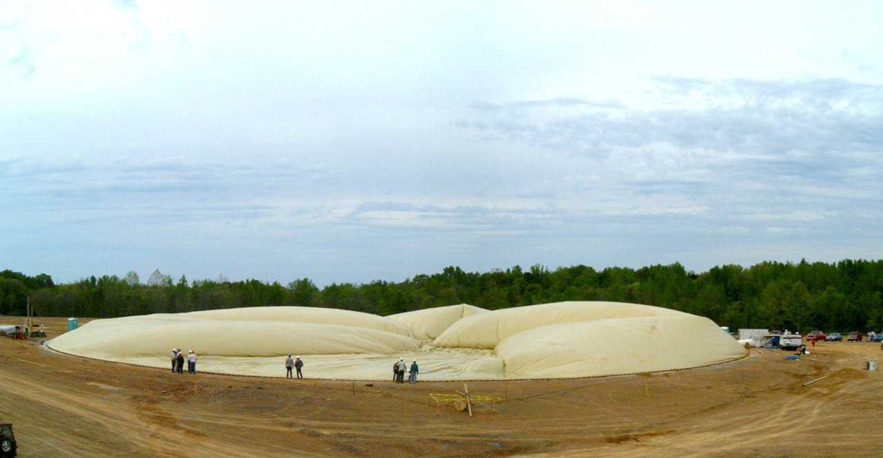 Inflating the Airform — A crew inflated the Airform and constructed the dome shell.