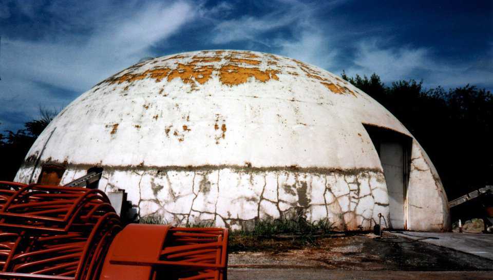 After 35 years, the dome was looking a bit worn. In the 1970s we used to peel the Airform membrane and coat the dome. Turns out to be cheaper and better to leave the membrane on.