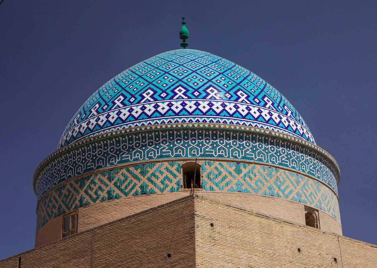 Yazd, Iran — Intricate decorative tile pattern covers this famous mosque.