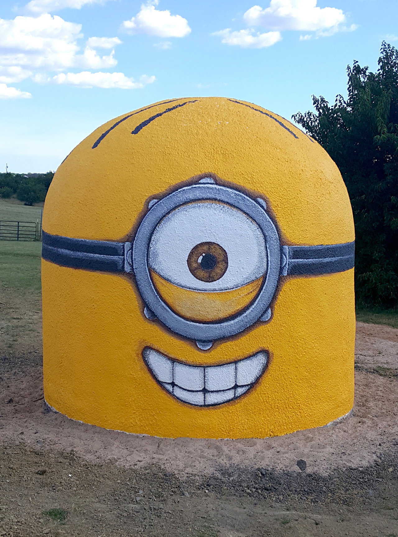 An Ecoshell tornado shelter painted as a Minion from Despicable Me.