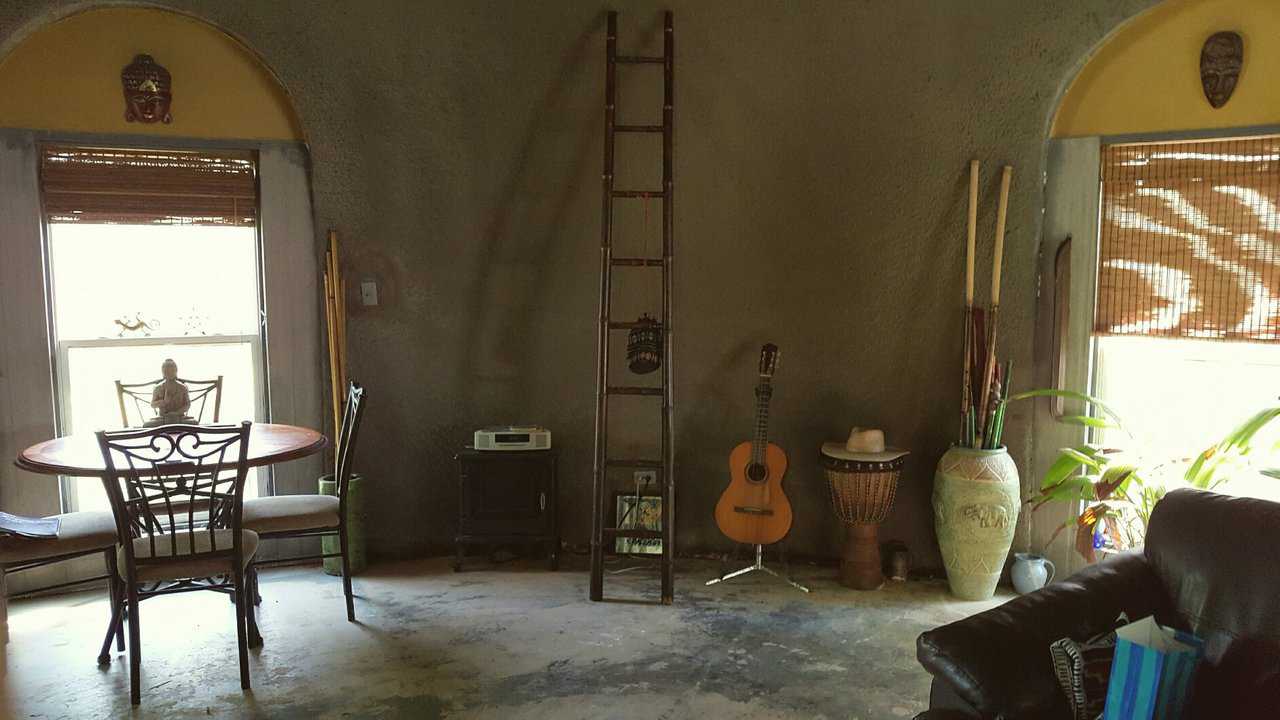 A view of the interior of the dome, with several instruments visible including guitar and drum.