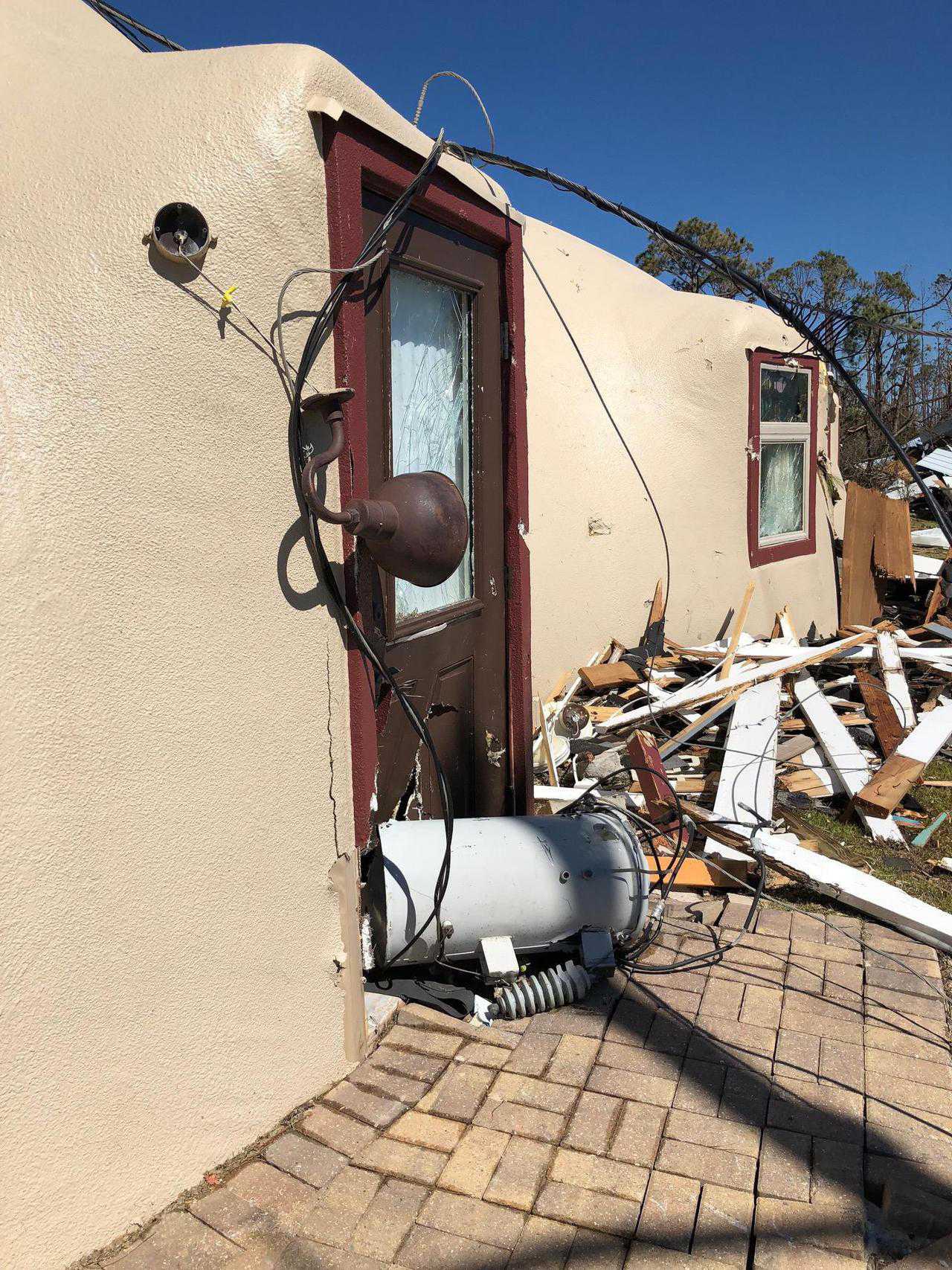 Transformer and damaged garage door