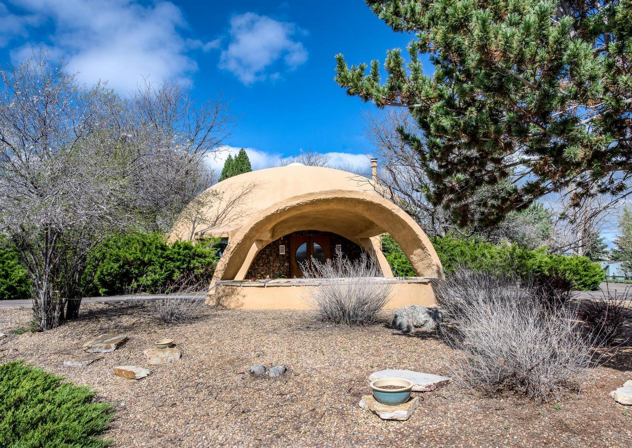 Low maintenance landscaping compliments the exterior.