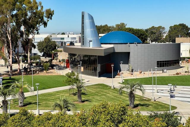 The spiral-shaped Planetarium with its Monolithic Dome theater and cone-shaped tower.